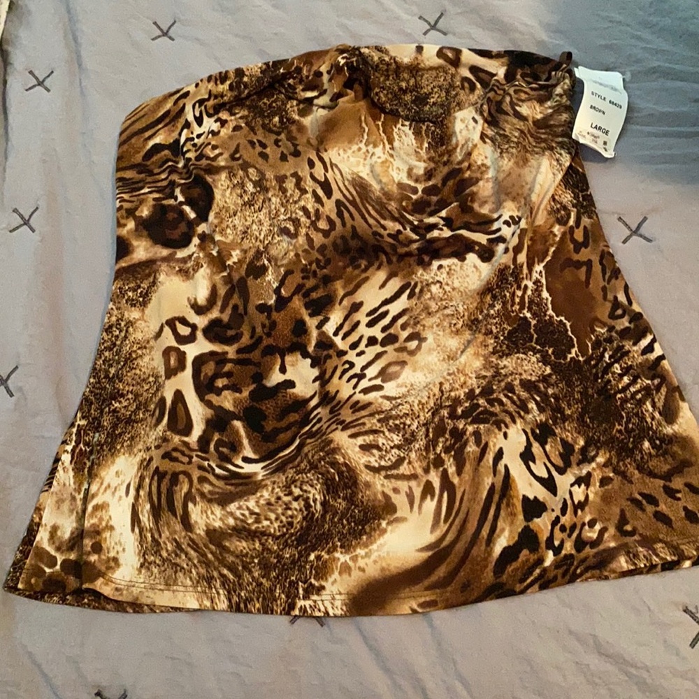 FREE WITH ANY BUNDLE PURCHASE Andrea Behar halter top? Bathing suit top?